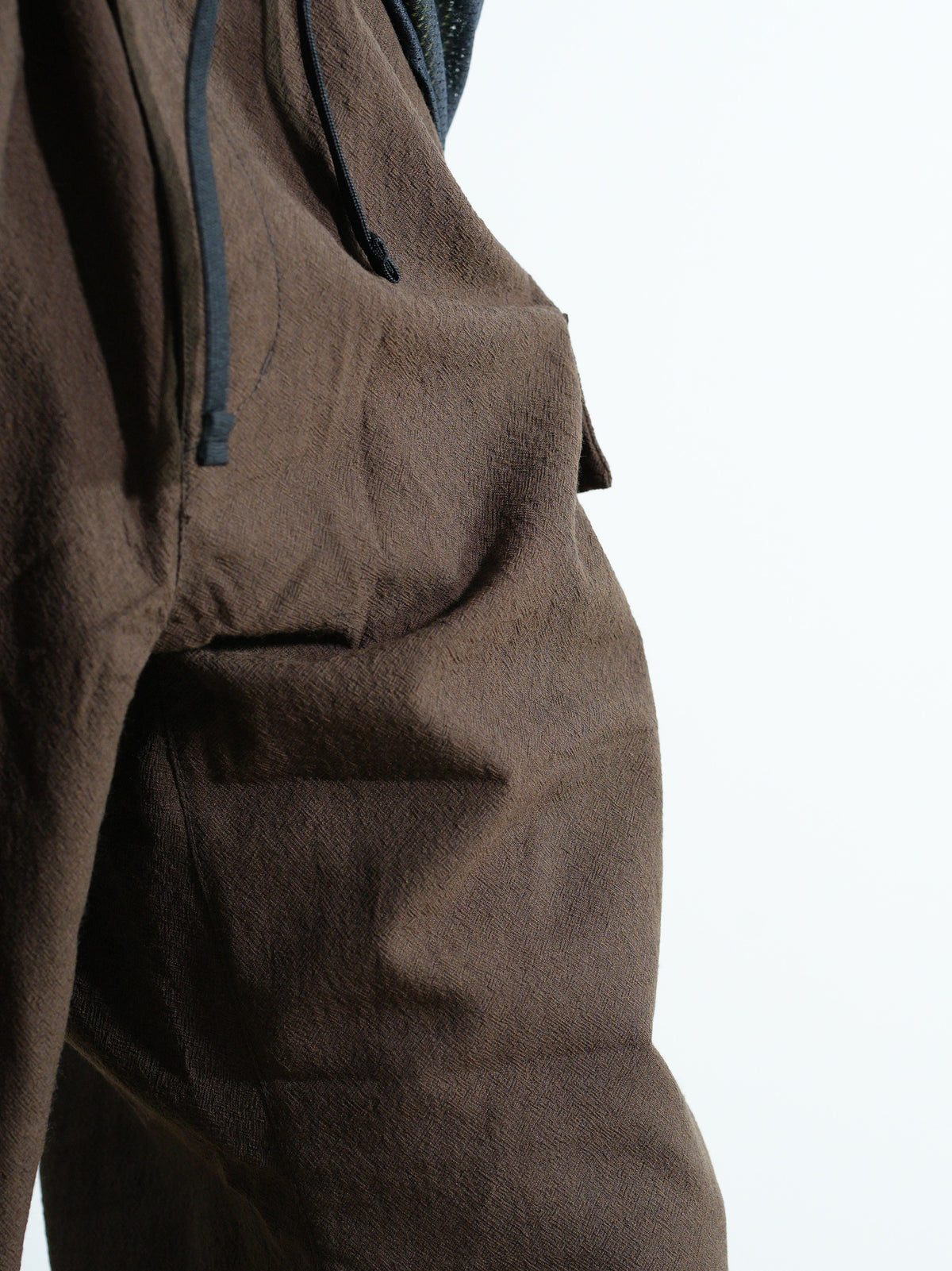 TECH WOOL ONE SIDE CARGO PANTS